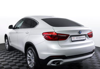 Подержанный автомобиль BMW X6 2016 года (7 фото)