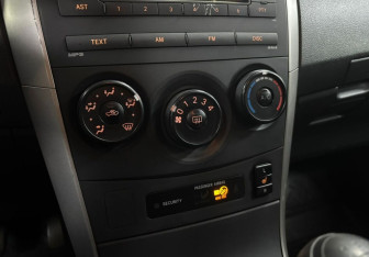 Подержанный автомобиль Toyota Corolla Sedan 2008 года (16 фото)