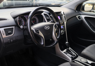 Подержанный автомобиль Hyundai i30 Hatchback 2014 года (12 фото)