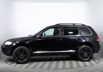Подержанный автомобиль Volkswagen Touareg 2004 года (8 фото)