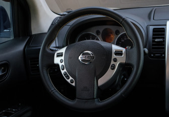 Подержанный автомобиль Nissan X-Trail 2010 года (11 фото)