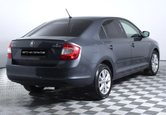 Подержанный автомобиль Skoda Rapid Liftback 2015 года (3 фото)