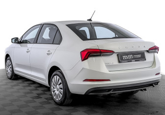 Подержанный автомобиль Skoda Rapid Liftback 2021 года (7 фото)