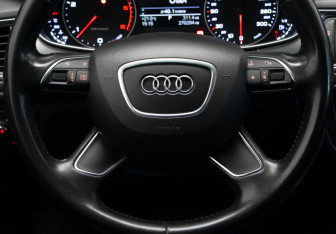 Подержанный автомобиль Audi A6 allroad 2014 года (10 фото)