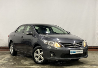 Подержанный автомобиль Toyota Corolla Sedan 2011 года (3 фото)