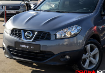 Подержанный автомобиль Nissan Qashqai+2 2010 года (18 фото)
