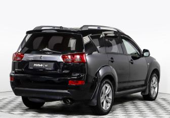 Подержанный автомобиль Peugeot 4007 2011 года (3 фото)