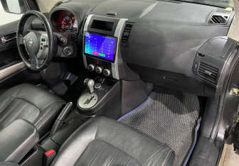 Подержанный автомобиль Nissan X-Trail 2013 года (9 фото)