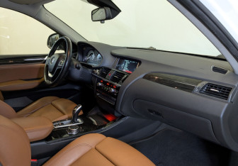 Подержанный автомобиль BMW X4 2015 года (10 фото)
