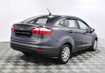 Подержанный автомобиль Ford Fiesta Sedan 2017 года (3 фото)