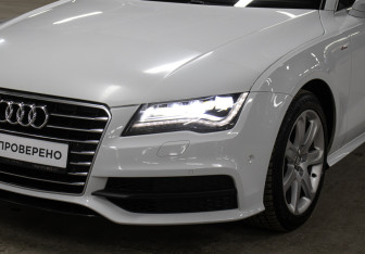 Подержанный автомобиль Audi A7 2014 года (25 фото)