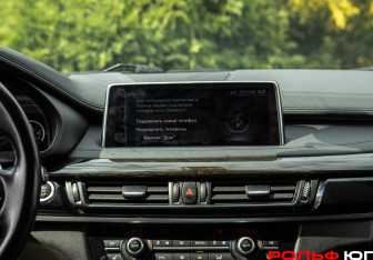 Подержанный автомобиль BMW X6 2017 года (12 фото)