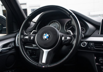 Подержанный автомобиль BMW X5 2016 года (14 фото)