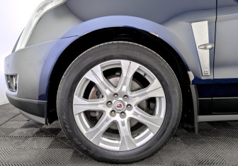 Подержанный автомобиль Cadillac SRX 2011 года (18 фото)