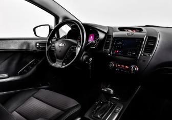 Подержанный автомобиль Kia Cerato Sedan 2013 года (11 фото)