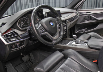 Подержанный автомобиль BMW X5 2016 года (16 фото)