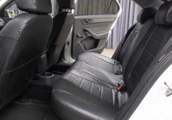 Подержанный автомобиль Skoda Rapid Liftback 2014 года (12 фото)