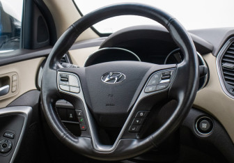 Подержанный автомобиль Hyundai Santa Fe 2014 года (15 фото)