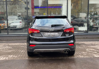 Подержанный автомобиль Hyundai Santa Fe 2013 года (7 фото)