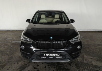 Подержанный автомобиль BMW X1 2015 года (2 фото)