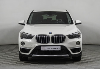 Подержанный автомобиль BMW X1 2016 года (2 фото)