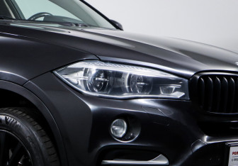 Подержанный автомобиль BMW X6 2016 года (16 фото)