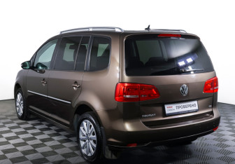 Подержанный автомобиль Volkswagen Touran 2013 года (7 фото)