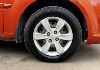 Подержанный автомобиль Kia Rio Sedan 2010 года (13 фото)