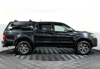 Подержанный автомобиль Toyota Hilux 2013 года (4 фото)