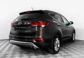 Подержанный автомобиль Hyundai Santa Fe 2016 года (3 фото)