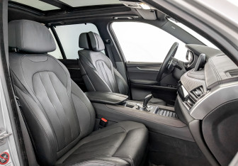 Подержанный автомобиль BMW X5 2014 года (24 фото)