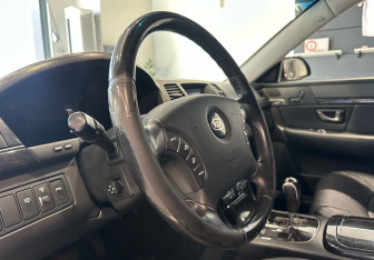 Подержанный автомобиль Kia Opirus 2008 года (12 фото)