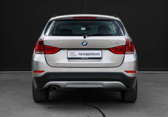 Подержанный автомобиль BMW X1 2014 года (5 фото)