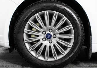 Подержанный автомобиль Ford Mondeo Sedan 2015 года (15 фото)