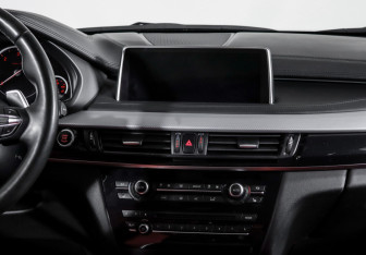 Подержанный автомобиль BMW X6 2016 года (13 фото)