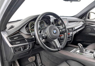 Подержанный автомобиль BMW X5 2014 года (16 фото)