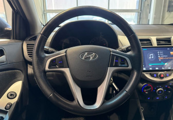 Подержанный автомобиль Hyundai Solaris Sedan 2013 года (14 фото)