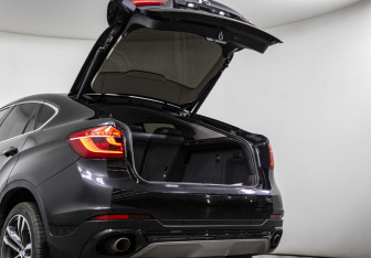 Подержанный автомобиль BMW X6 2016 года (16 фото)