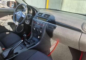 Подержанный автомобиль Mazda 3 Sedan 2007 года (11 фото)