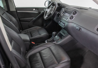 Подержанный автомобиль Volkswagen Tiguan 2013 года (9 фото)
