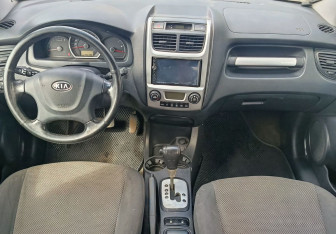 Подержанный автомобиль Kia Sportage 2010 года (10 фото)