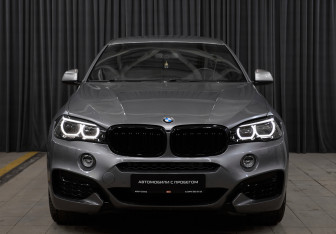 Подержанный автомобиль BMW X6 2014 года (2 фото)