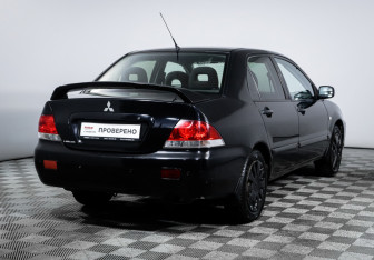 Подержанный автомобиль Mitsubishi Lancer Sedan 2009 года (5 фото)