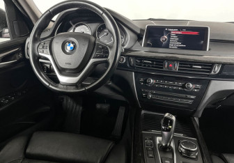 Подержанный автомобиль BMW X5 2015 года (15 фото)