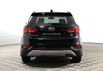 Подержанный автомобиль Hyundai Santa Fe 2016 года (4 фото)