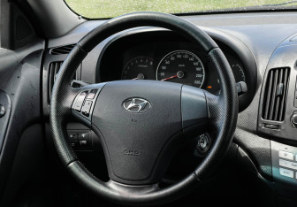 Подержанный автомобиль Hyundai Elantra Sedan 2009 года (14 фото)