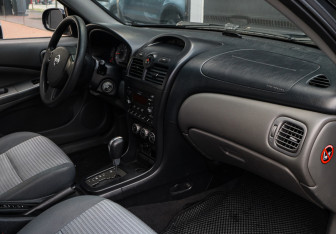 Подержанный автомобиль Nissan Almera Classic 2011 года (7 фото)