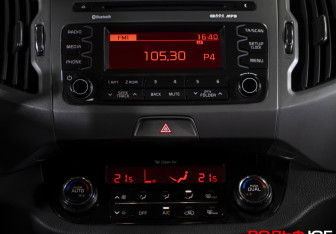 Подержанный автомобиль Kia Sportage 2015 года (14 фото)