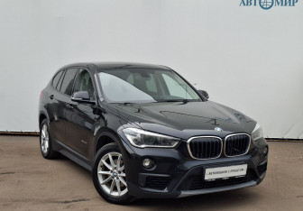 Подержанный автомобиль BMW X1 2015 года (3 фото)