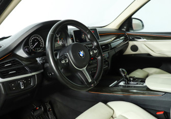 Подержанный автомобиль BMW X5 2014 года (13 фото)